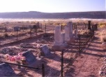 Bluff, Utah -- Bluff Cemetery overlooking the morning mist-filled Bluff valley, Lamont Crabtree Photo